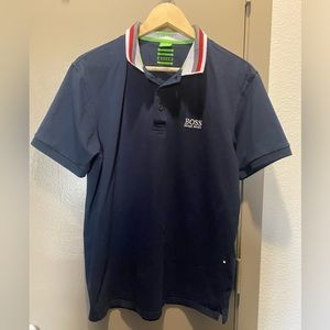 Hugo boss. XL. Navy polo shirt with neon stitching on the side (not s stain).
